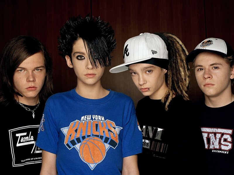 Four young men in band photo