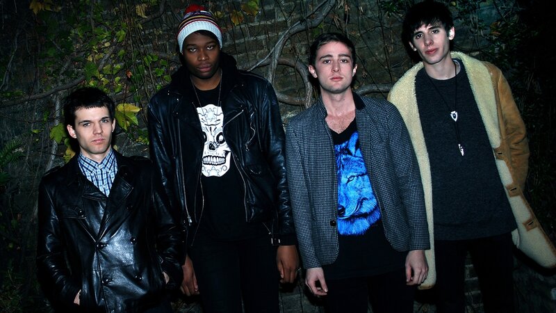 four young men in urban attire