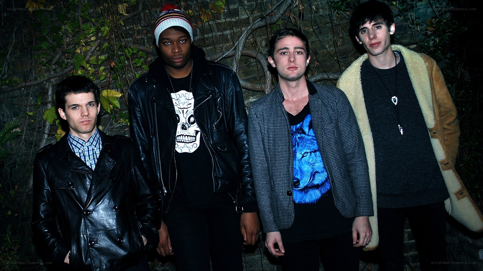 four young men in urban attire