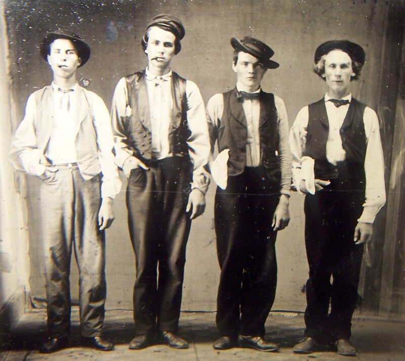 Four Young Men in Vests