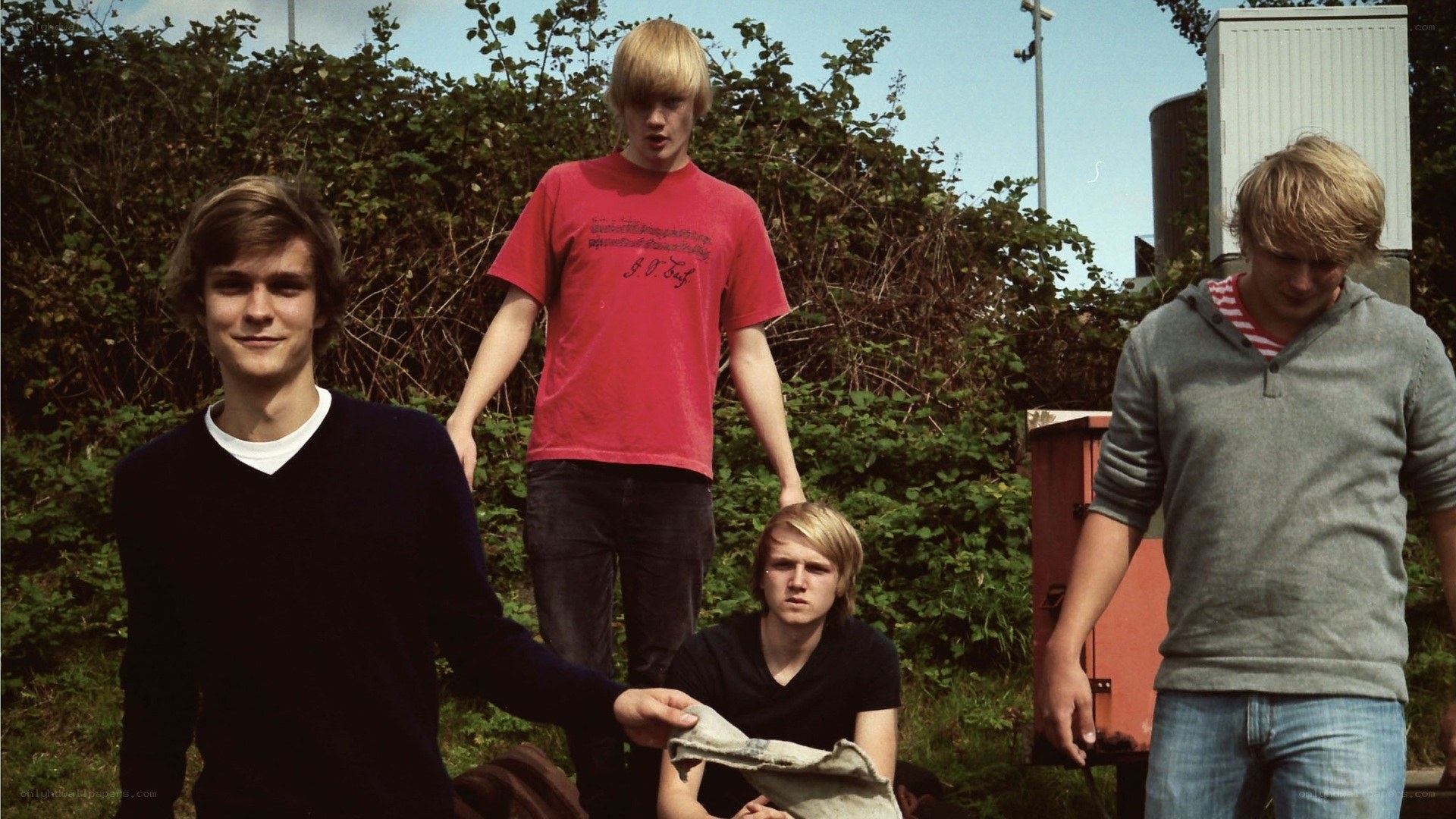 four young men outdoors