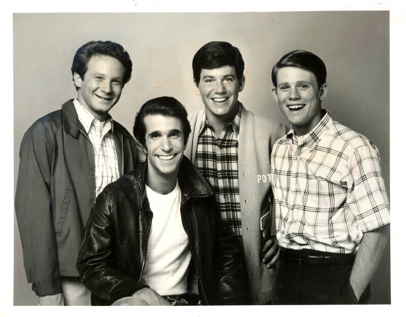 Four Young Men Posing