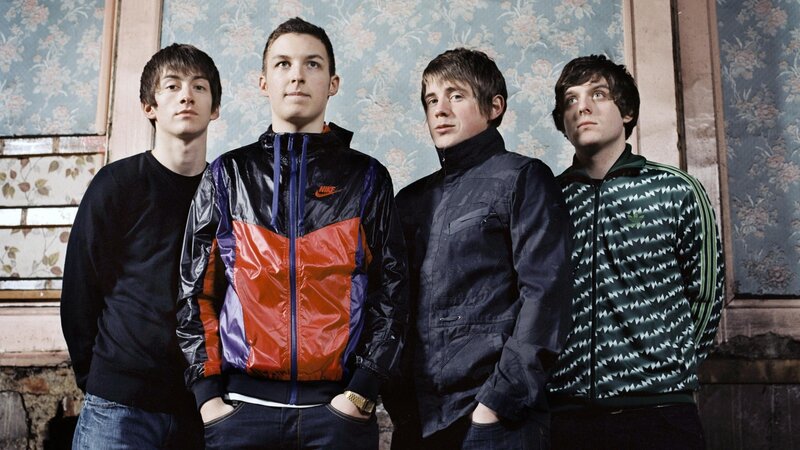Four Young Men Standing — Blue, Serious