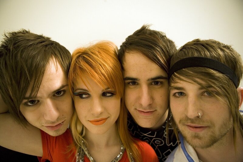 Four Young People Posing — Orange