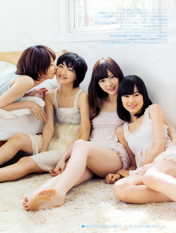 Four young women in light dresses