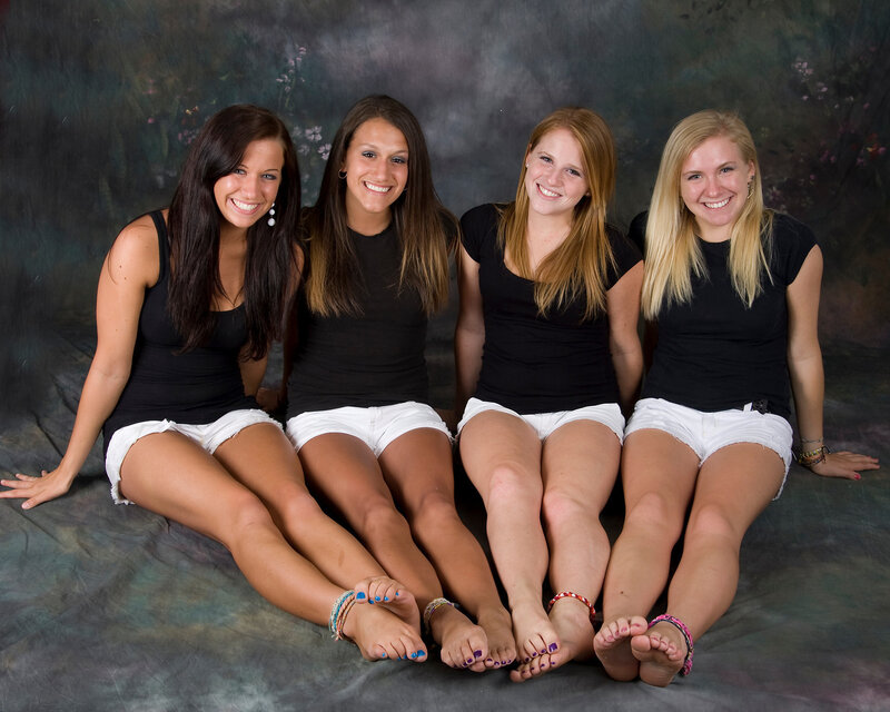 four young women in studio portrait