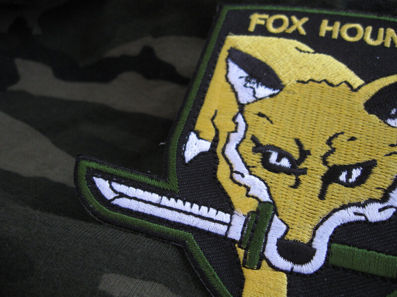 Fox Hound patch on camouflage