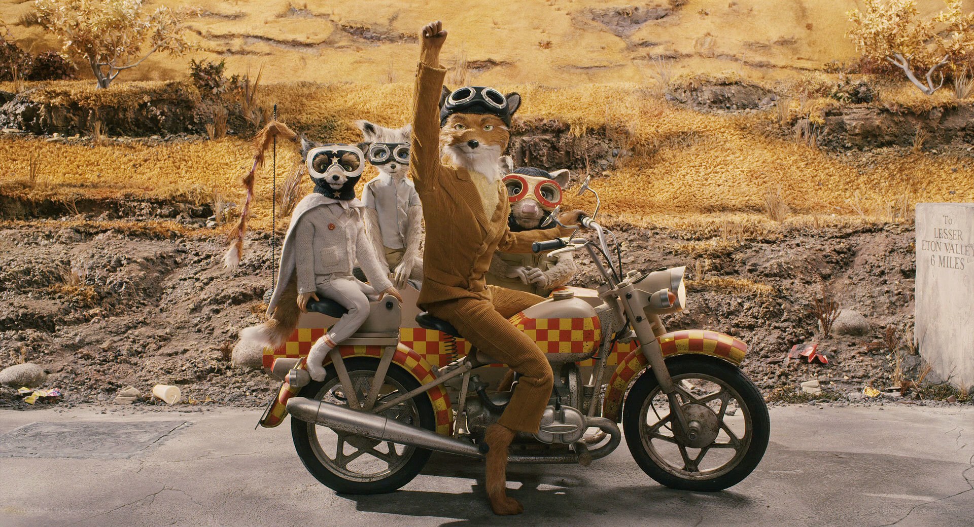 fox on a motorcycle with friends
