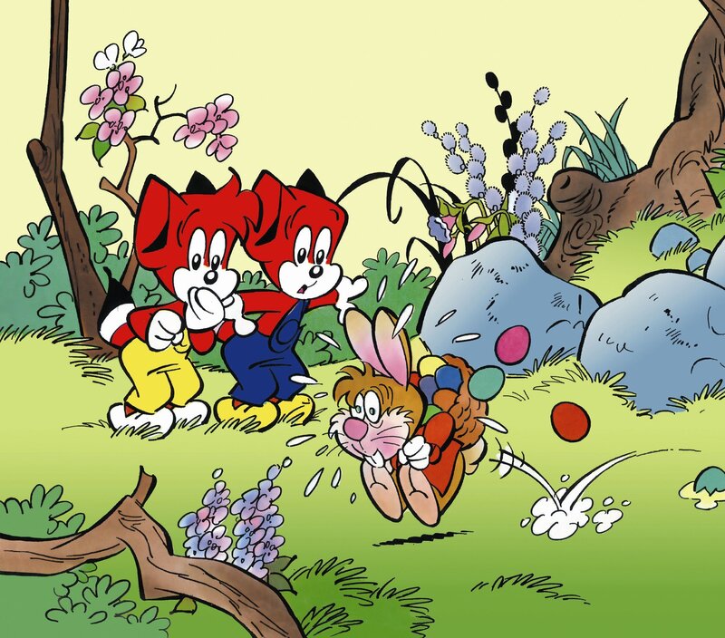 Foxes chasing a rabbit