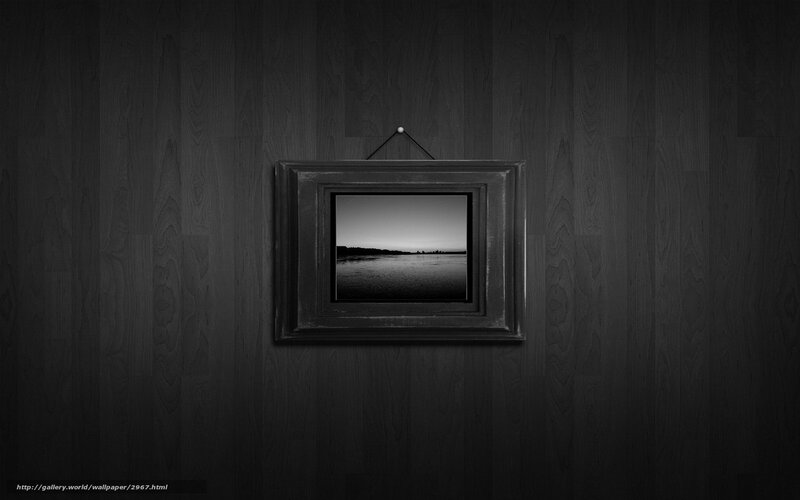 framed photo on dark wall