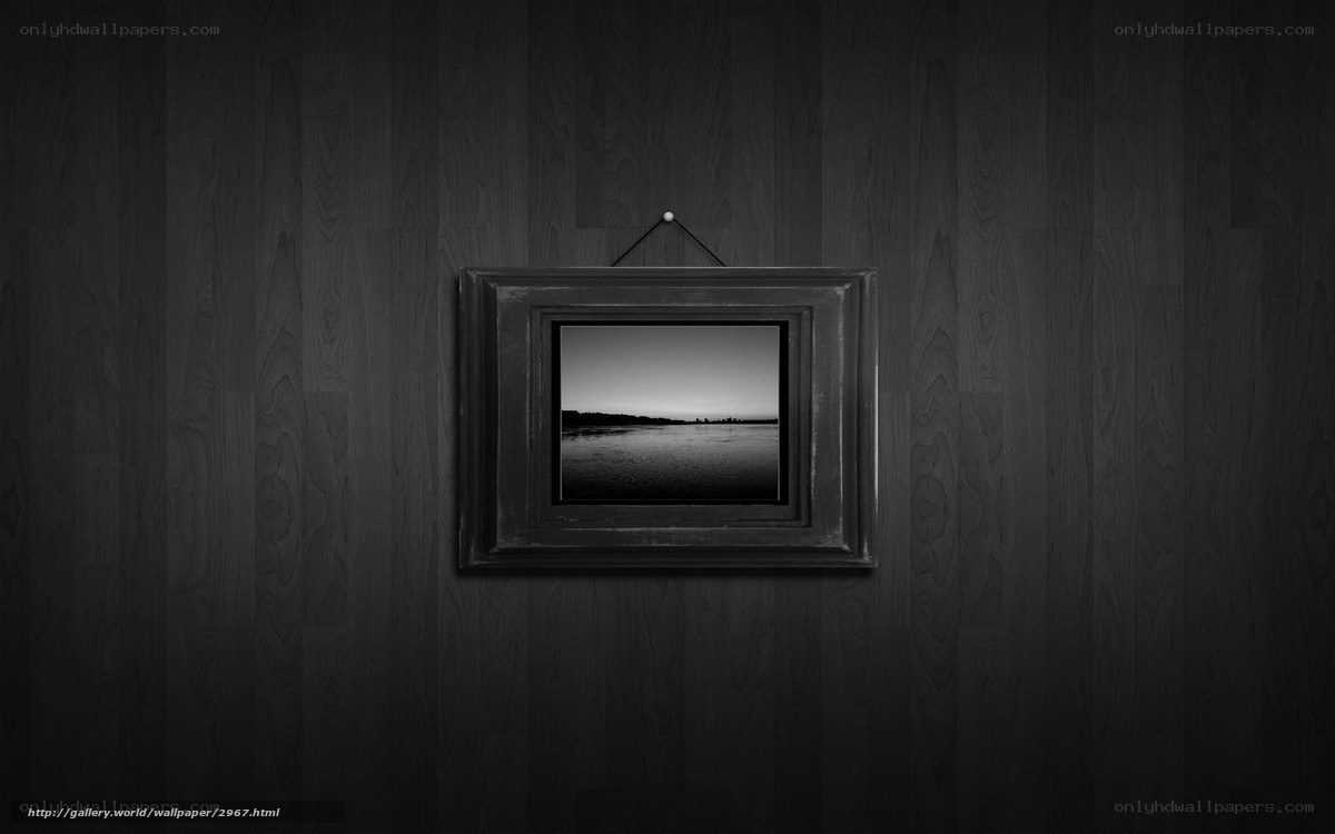 framed photo on dark wall