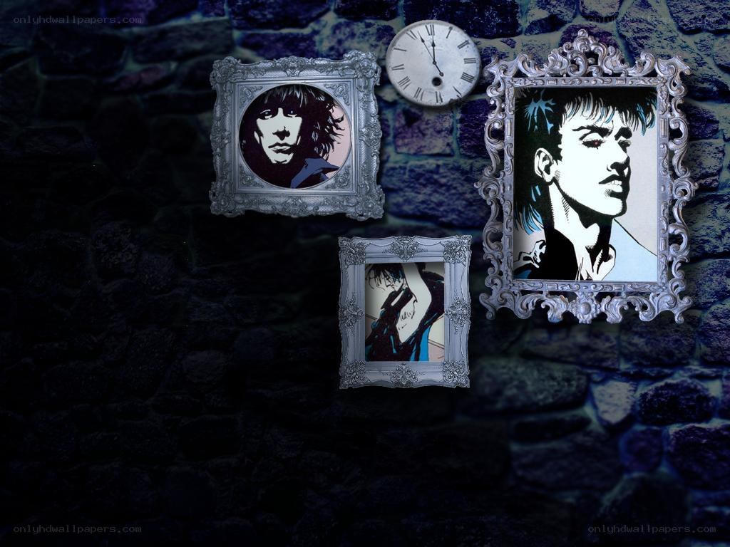framed portraits on stone wall