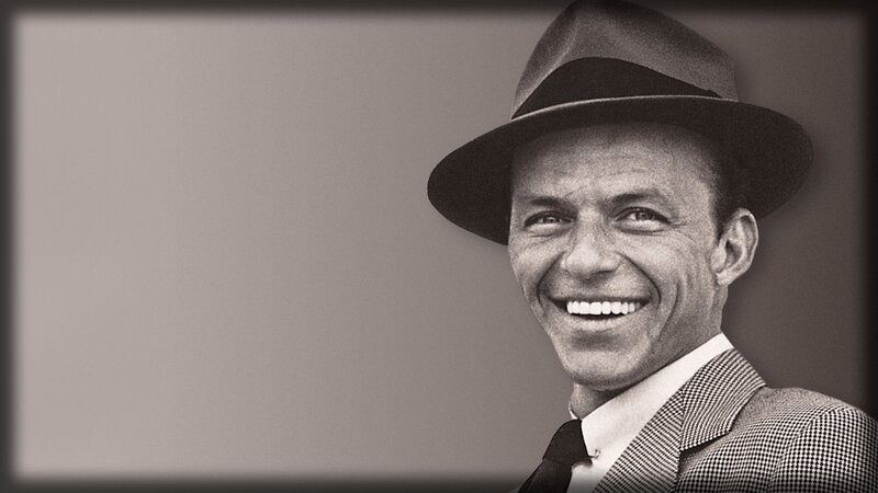 Frank Sinatra smiling in hat