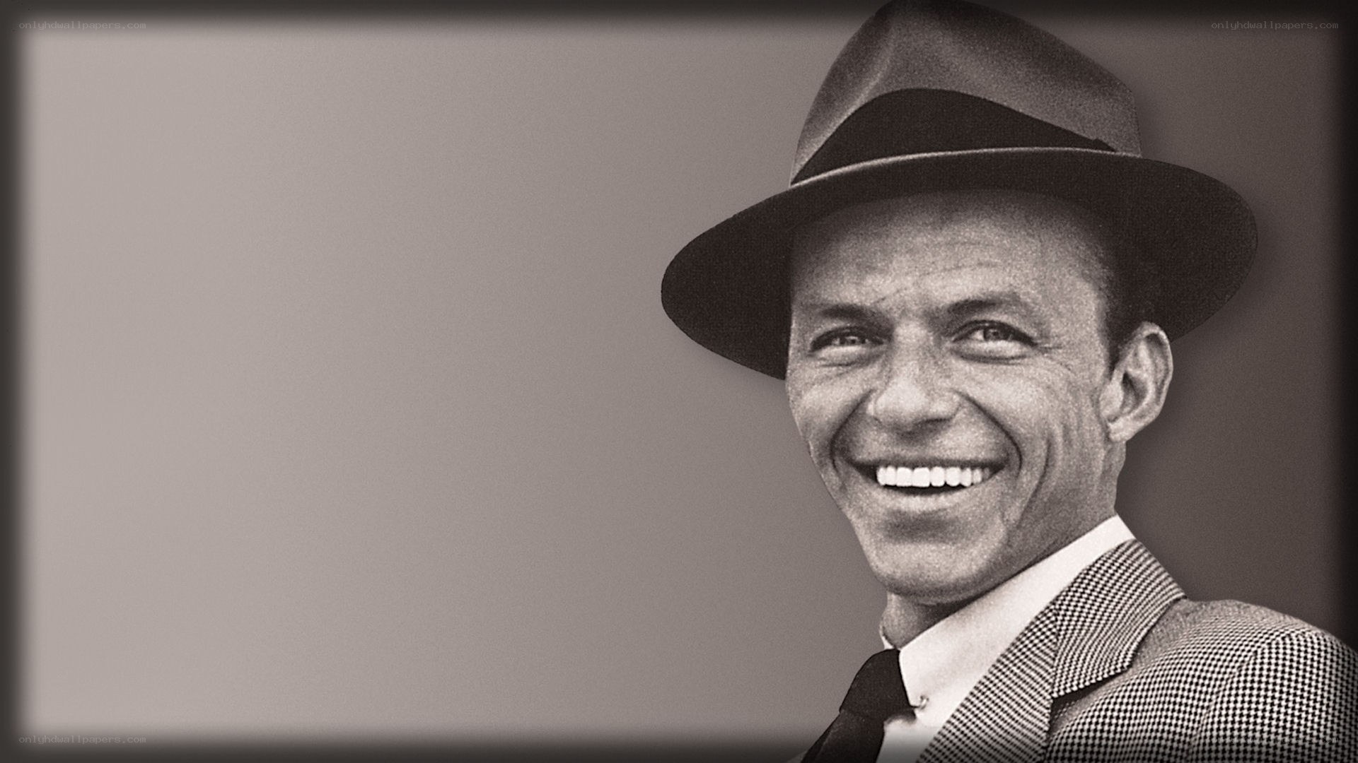 Frank Sinatra smiling in hat