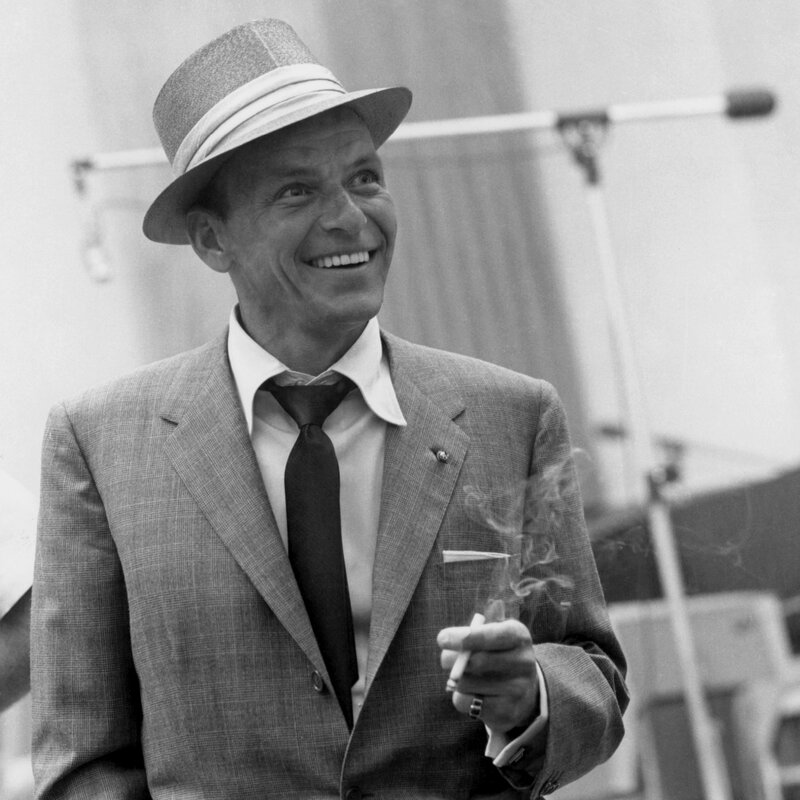 Frank Sinatra smiling with cigarette