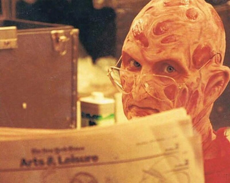 Freaky-faced Man Reading