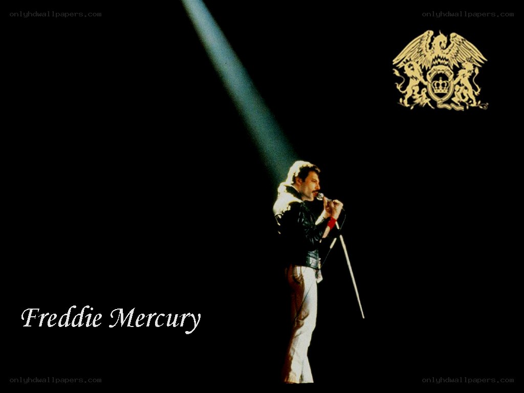 Freddie Mercury performing on stage