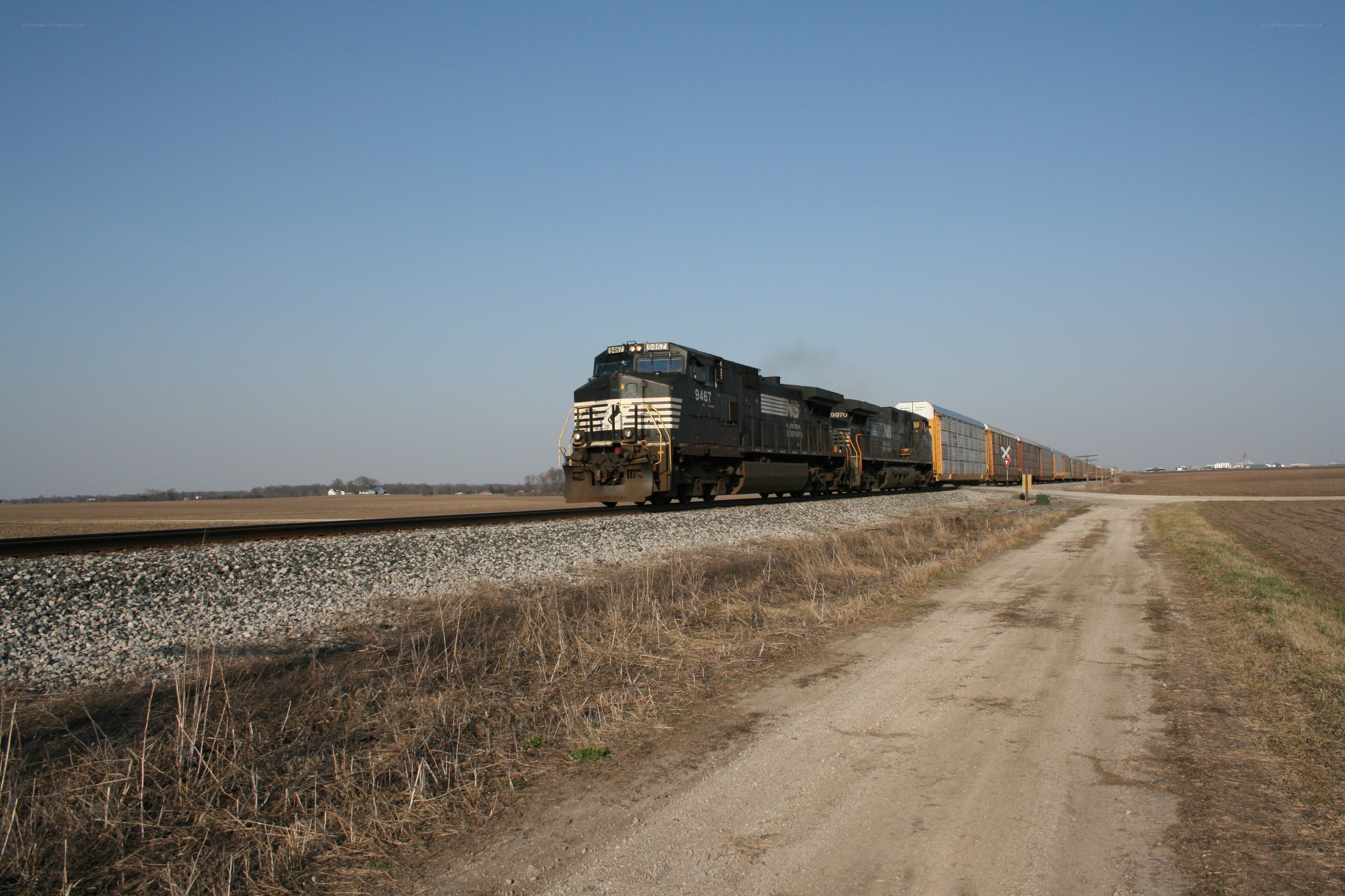 Freight train in rural landscape