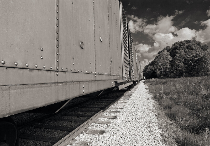 Freight Train on Tracks — Black, Dramatic