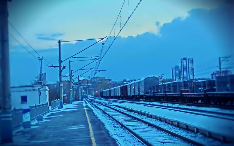Freight Train on Tracks — Blue, Cold