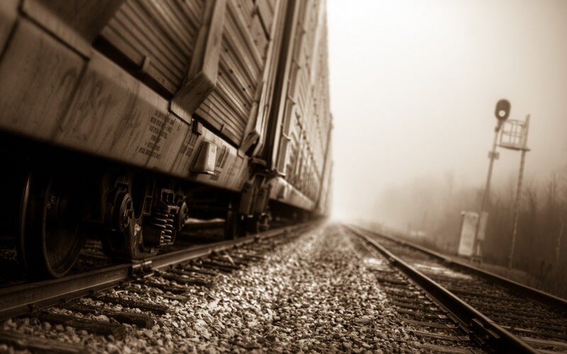 Freight Train on Tracks — Brown, Moody