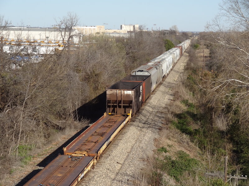 Freight Train on Tracks — Brown