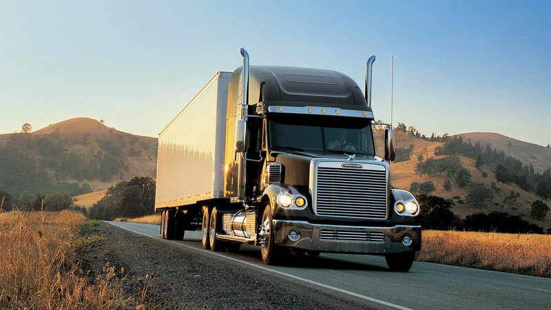 Freightliner truck on a country road