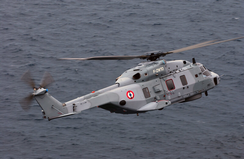French military helicopter over ocean