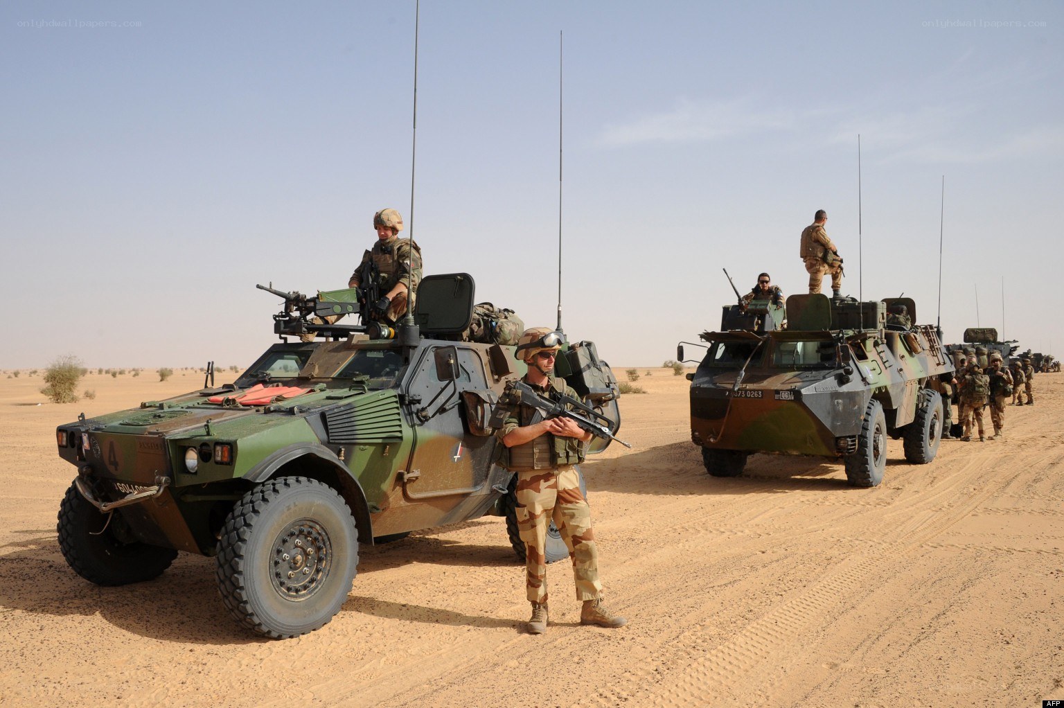 French soldiers in desert convoy