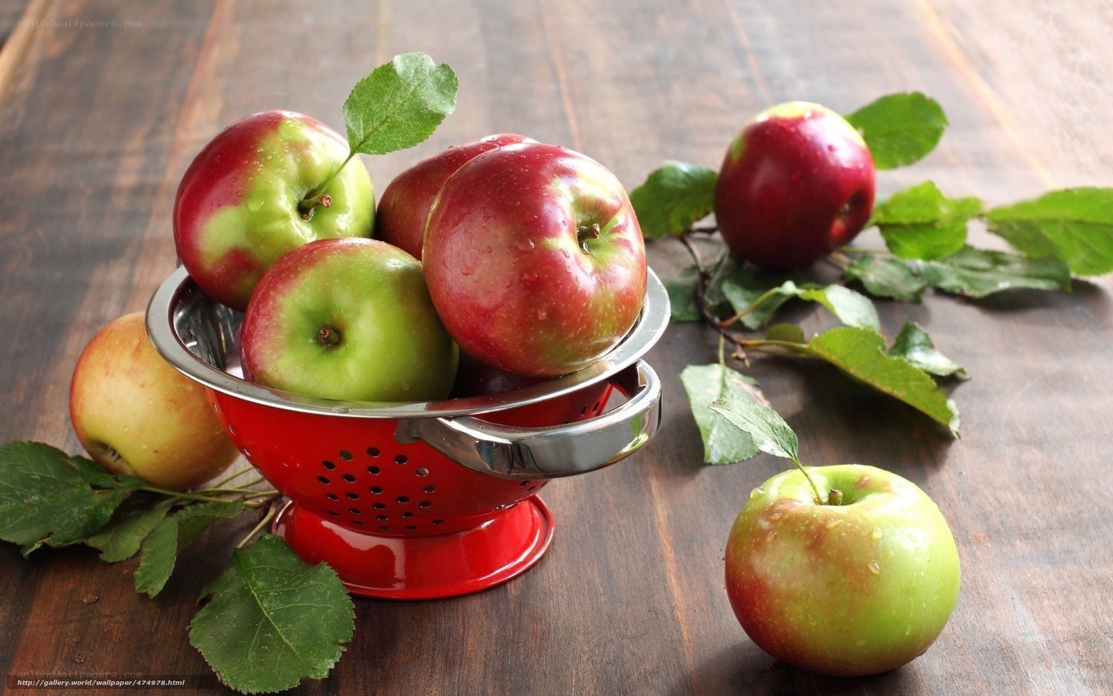 Fresh apples in a colander
