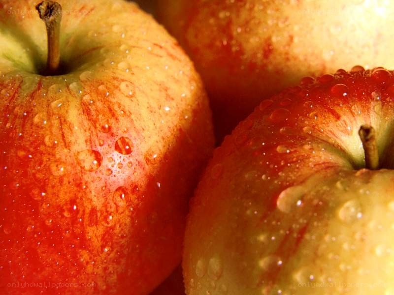 Fresh apples with water droplets