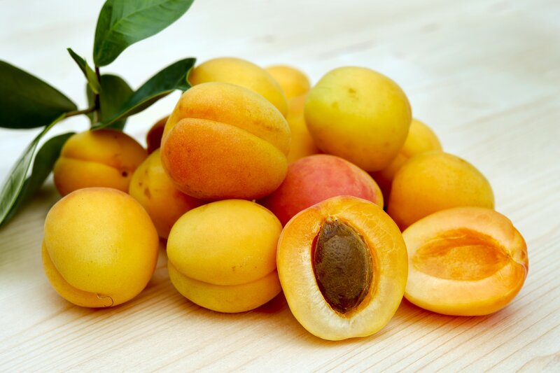 Fresh Apricots on Wood