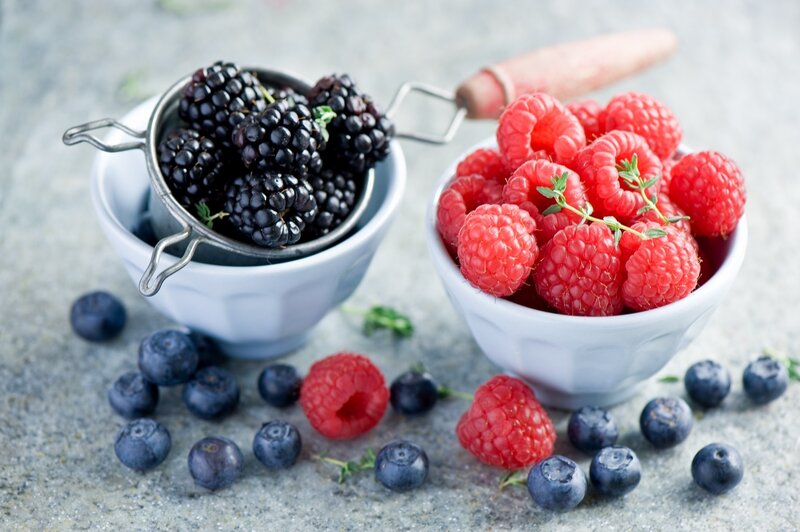 Fresh berries in bowls