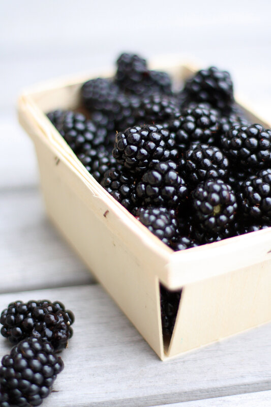 Fresh blackberries in a wooden basket