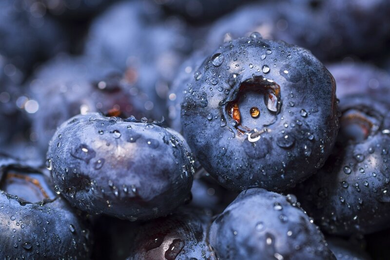Fresh blueberries with water droplets