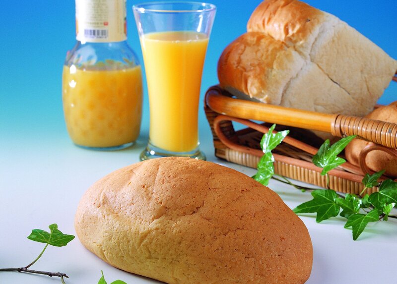 Fresh bread and orange juice