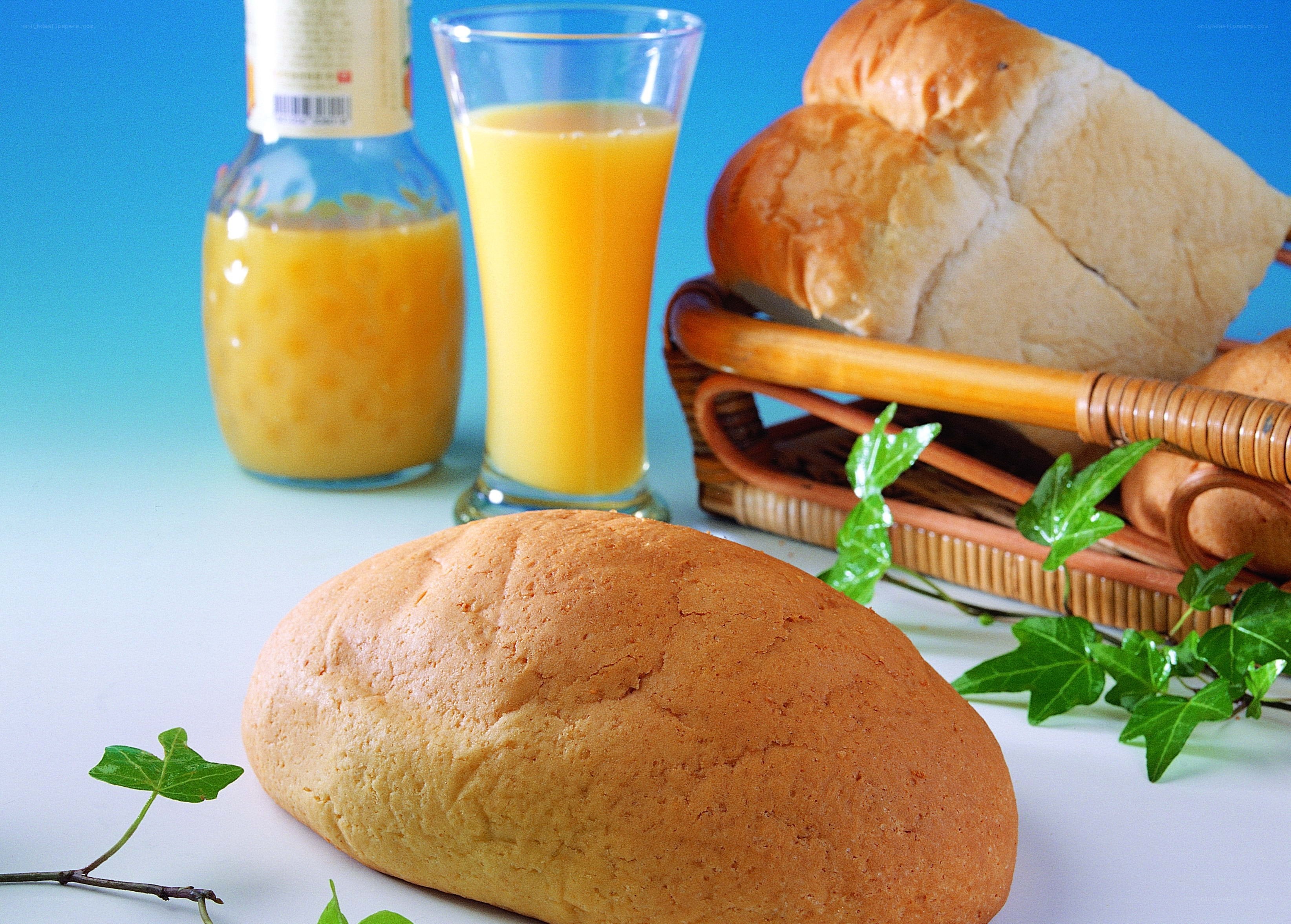 Fresh bread and orange juice
