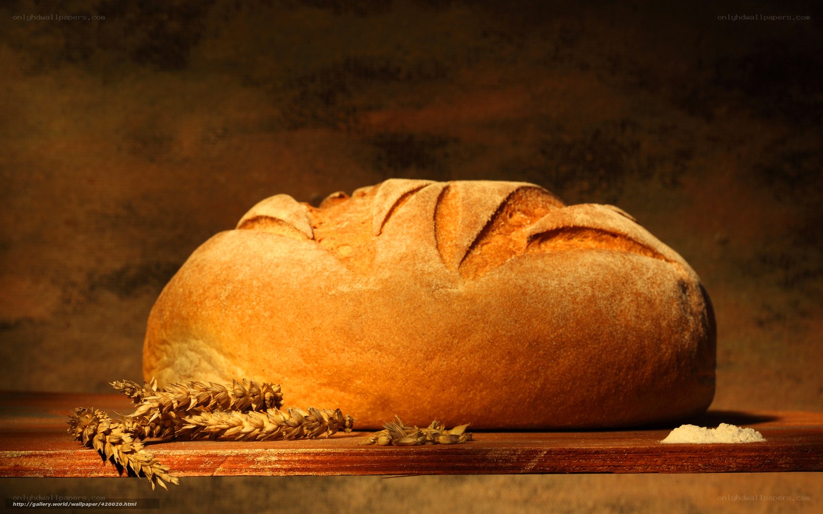 Fresh bread on wooden board