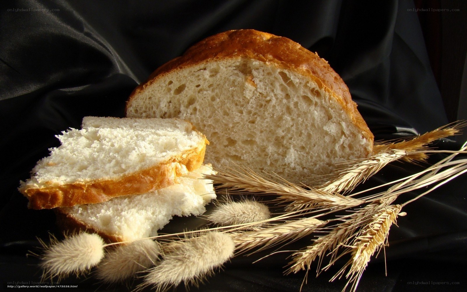 Fresh bread with wheat stalks