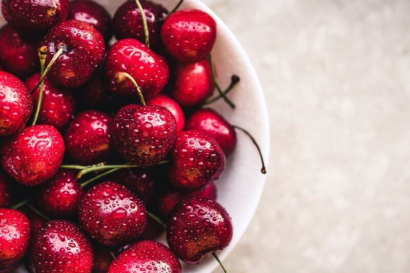 Fresh cherries in a bowl