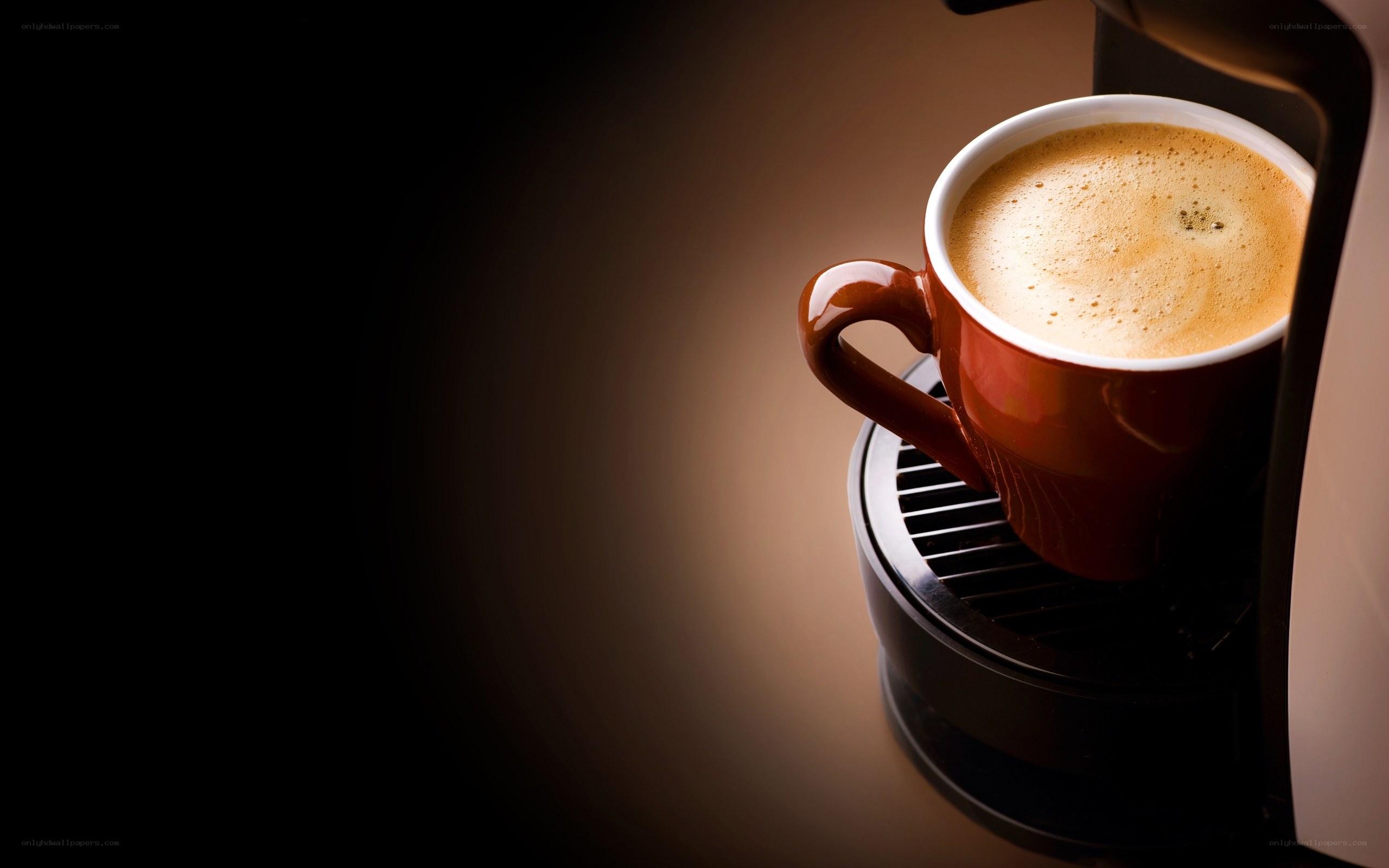 Fresh coffee in a red cup