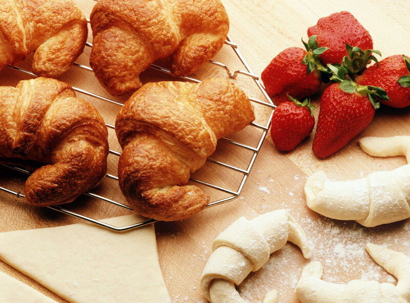 Fresh croissants and strawberries