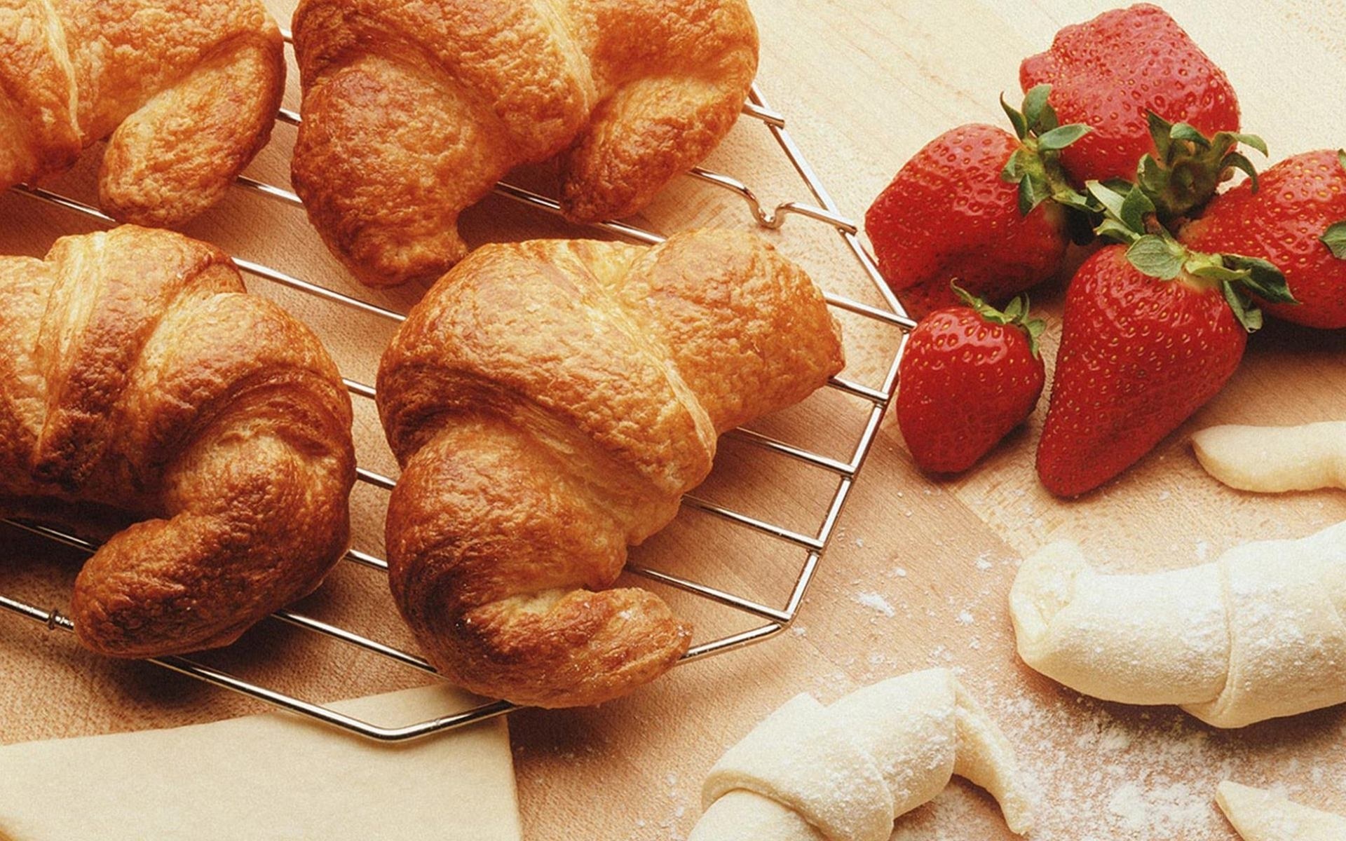 Fresh croissants and strawberries
