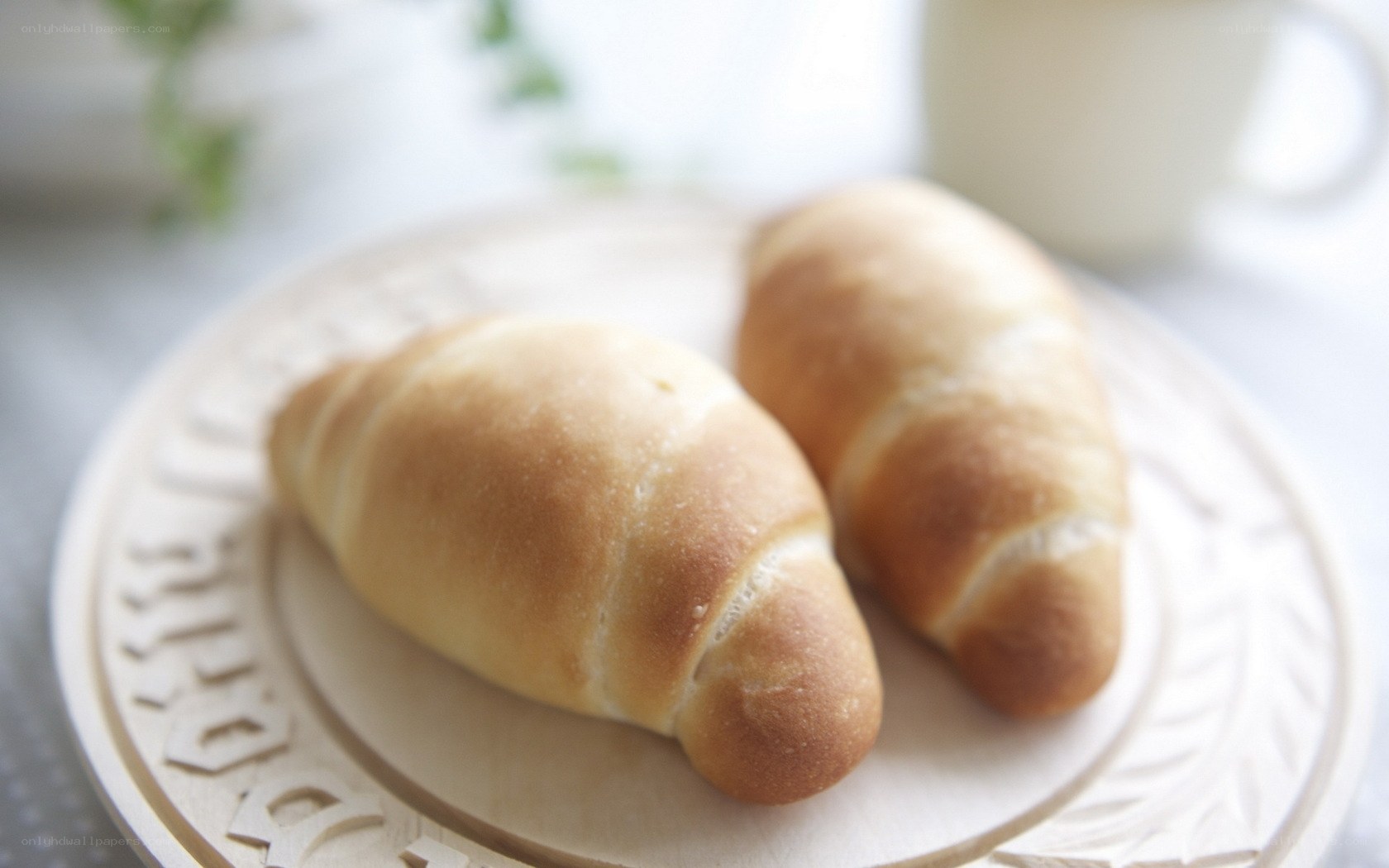 Fresh croissants on a plate