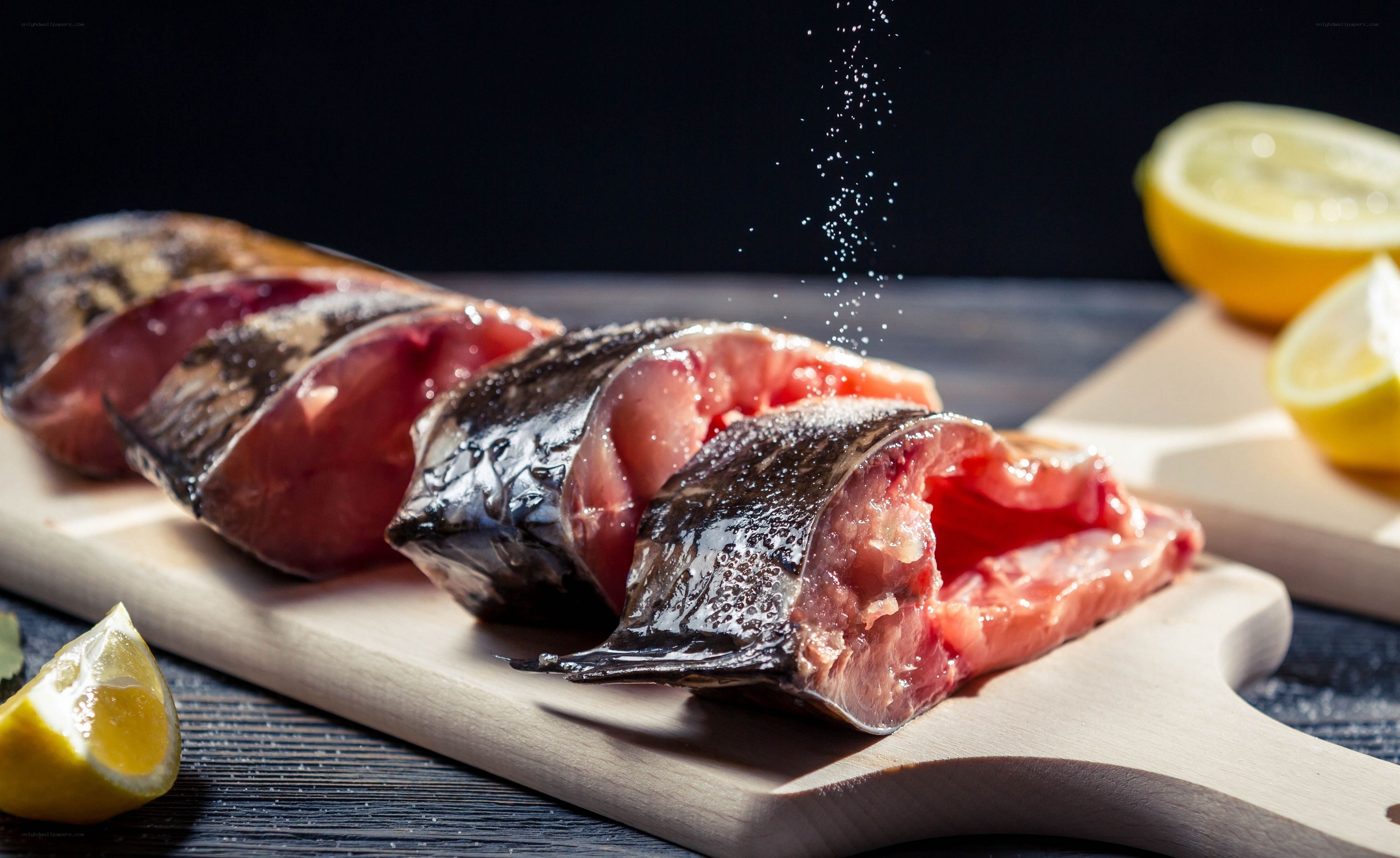 Fresh fish being seasoned