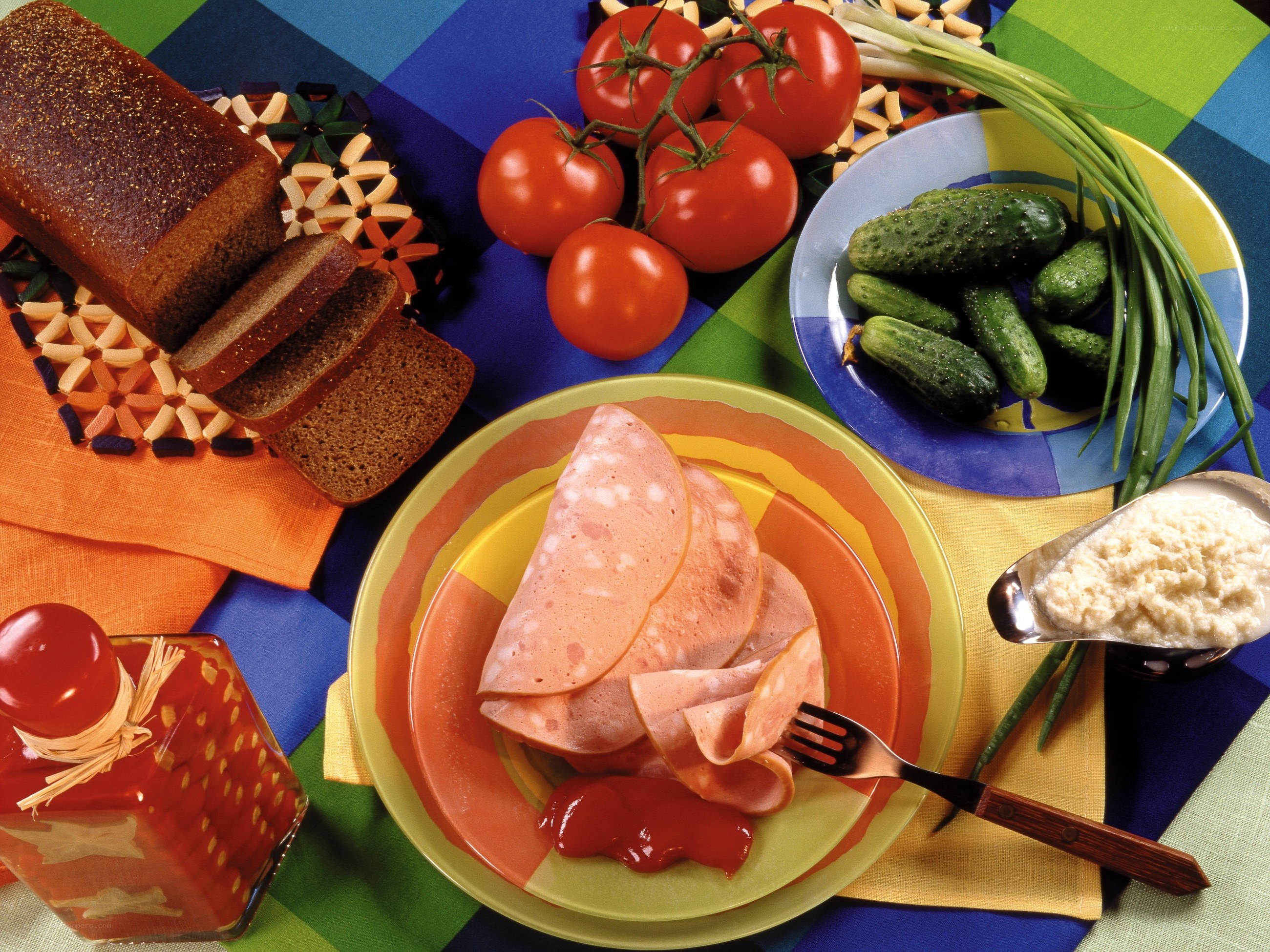 Fresh food spread on colorful table