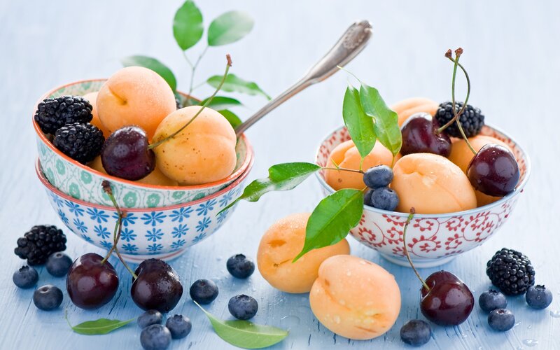Fresh fruit in decorative bowls