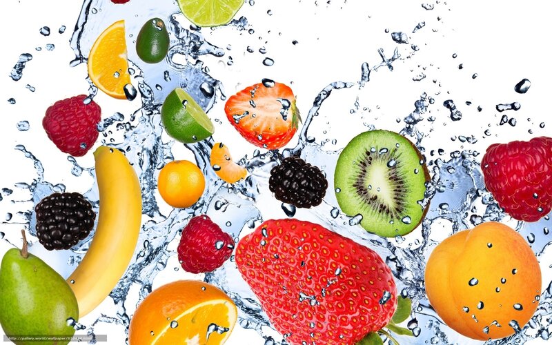 fresh fruits splashing in water