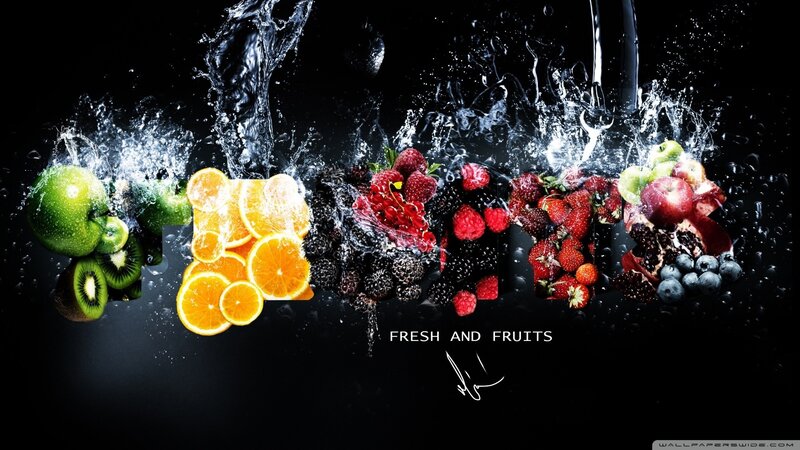 fresh fruits splashing in water