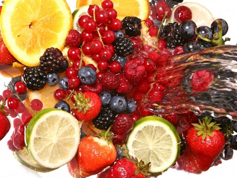 fresh fruits with splashing water